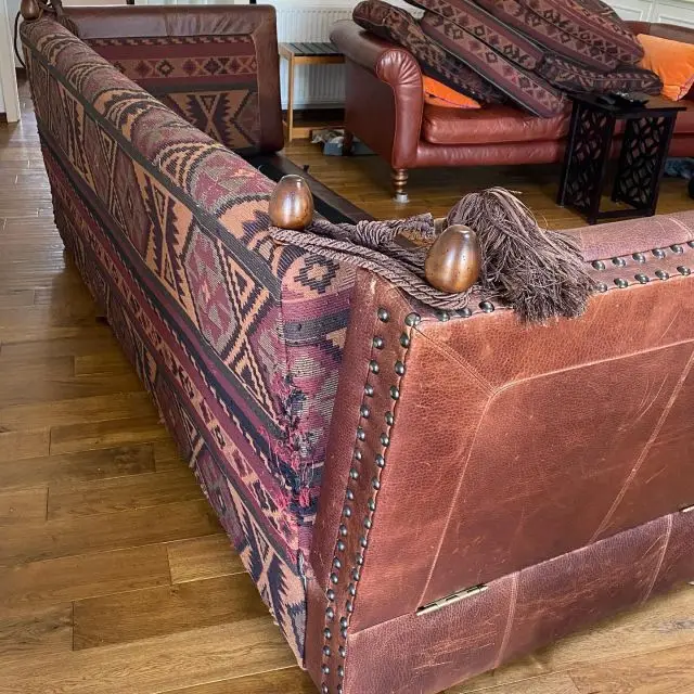In Cambridge yesterday working on site with @highcroft_interiors on this enormous sofa. First job was to clean and feed the leather before before beginning on the upholstery which is going to be transformed by some lovely green fabrics (last photo).