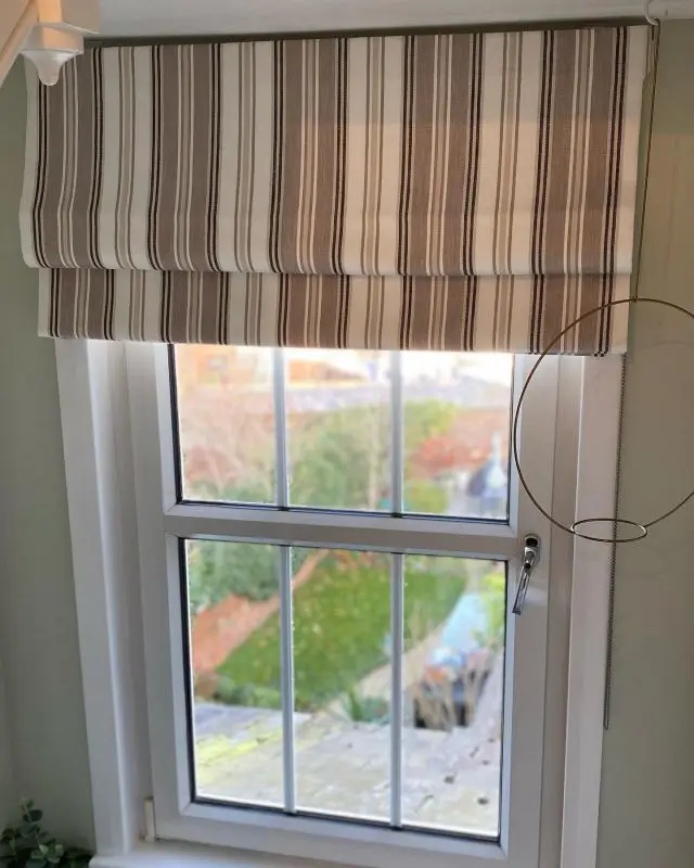 Brief moment to come up for air and post this neutral striped Roman for a landing window.